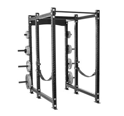 A black metal power rack with multiple adjustable holes, four upright posts, safety straps, and weight plates loaded on storage pegs, designed for weightlifting and strength training.