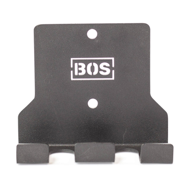 The Bells of Steel Hanging Barbell Holders are black metal, wall-mounted hooks with three prongs and two mounting holes, featuring a white "BOS" logo—perfect for secure barbell storage in your lifting space.