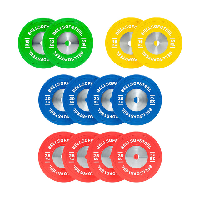 The Boltless KG Competition Bumper Plate Set by Bells of Steel USA includes twelve IWF-spec plates: four green 10 kg, four yellow 15 kg, and four red 25 kg—ideal for Olympic weightlifting enthusiasts.