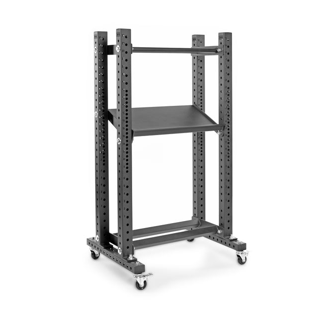 The Hydra Flat Foot Components by Bells of Steel is a tall, black metal storage rack on wheels with adjustable perforated shelving and a versatile flat foot support system. It includes one middle shelf, and its sturdy frame is designed for heavy-duty use.