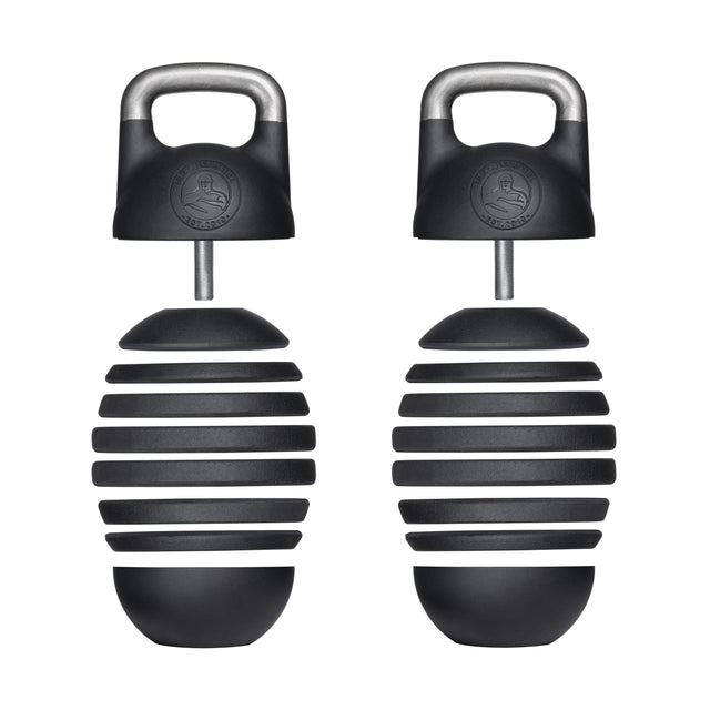 Two black and silver "Bells of Steel" Adjustable Competition Kettlebells, resembling competition-style kettlebells, feature a unique ribbed oval shape and sturdy handles. One is disassembled to reveal its intricate internal parts, ideal for kettlebell training enthusiasts.
