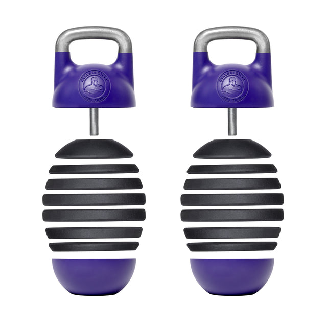 The Bells of Steel Adjustable Competition Kettlebell features two purple and black ergonomic grips, each with a handle for easy use. Ideal for kettlebell training, its segmented rubber surfaces enhance control and comfort during grip strengthening or forearm workouts.