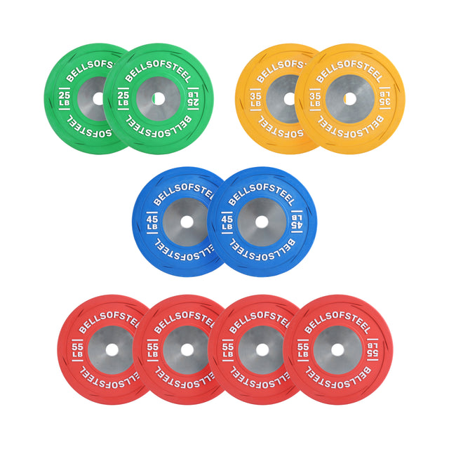 The Boltless LB Competition Bumper Plate Sets by Bells of Steel USA feature colorful 25 lb green, 35 lb yellow, 45 lb blue, and 55 lb red plates, ideal for Olympic lifting training on a white background.
