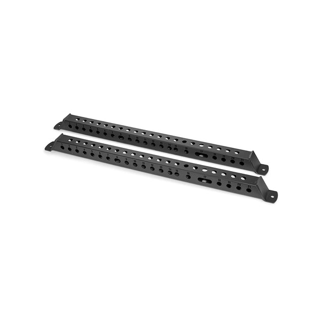 Laid parallel on a white background, two Manticore Flat Foot Components by Bells of Steel are black metal brackets with multiple holes for adjustable mounting, designed to complement Manticore power racks.