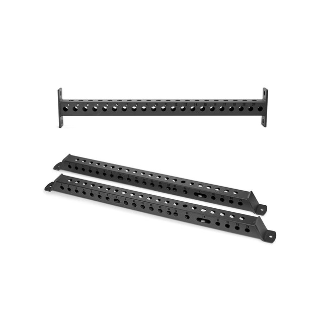 Three black metal brackets with multiple round holes, shown from various angles on a white background. These sturdy Bells of Steel Manticore Flat Foot Components are designed for use with Manticore power racks.