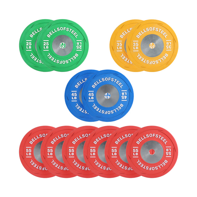 The Boltless LB Competition Bumper Plate Sets by Bells of Steel USA include two green 25 lb, two yellow 35 lb, two blue 45 lb, and six red 55 lb plates—ideal training plates for Olympic lifting in your gym.