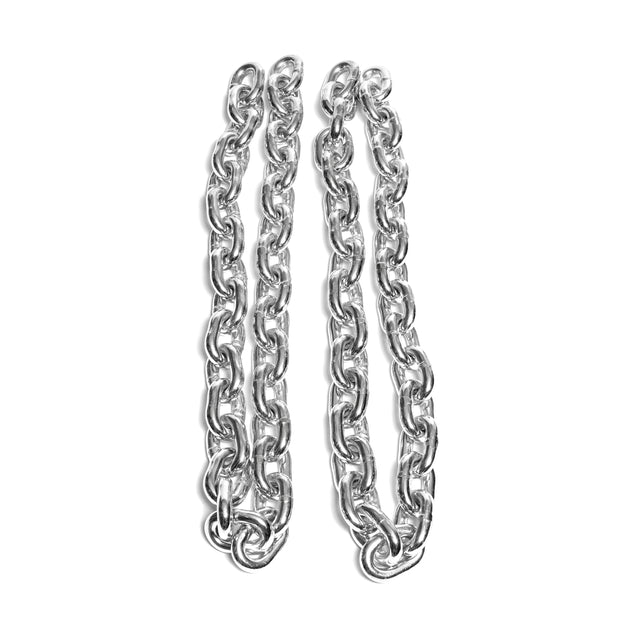 Two parallel, shiny silver Bells of Steel Weightlifting Chains with large oval links are laid out on a white background.