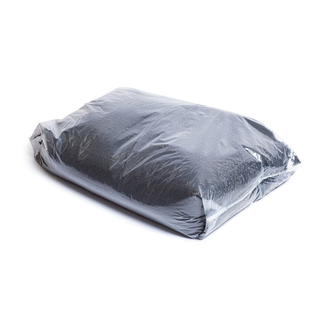 A 40lb bag of Bells of Steel Recycled Tire Rubber Crumb Filler, filled with crumb rubber, is shown sealed and clear against a white background.