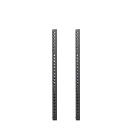 Two tall, vertical Hydra Vertical Uprights by Bells of Steel with evenly spaced holes stand side by side against a white background, aligned parallel and ready for rack attachments.