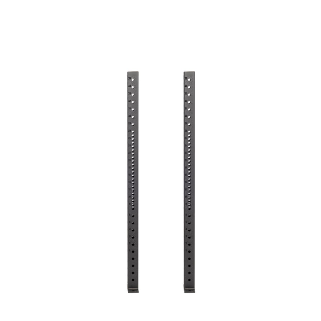 Two tall, vertical Hydra Vertical Uprights by Bells of Steel with evenly spaced holes stand side by side against a white background, aligned parallel and ready for rack attachments.