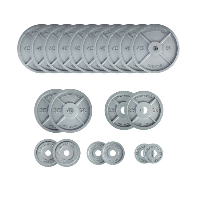 Bells of Steel Machined Iron Olympic Weight Plate Sets feature gray cast iron plates, precision-machined for a snug fit and labeled by weight—45, 35, 25, 10, 5, and 2.5 lbs—for reliable performance in every workout.
