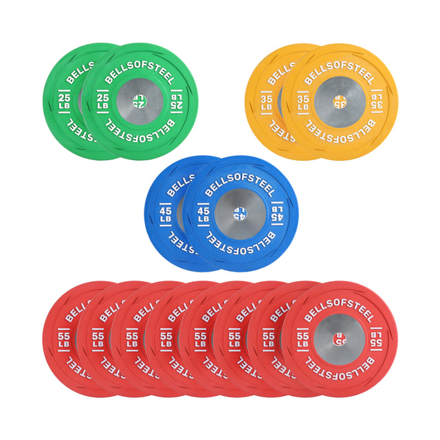 A set of Bells of Steel USA Boltless LB Competition Bumper Plate Sets—pairs in green 25 lb, yellow 35 lb, blue 45 lb, and red 55 lb—are neatly arranged on a white background.