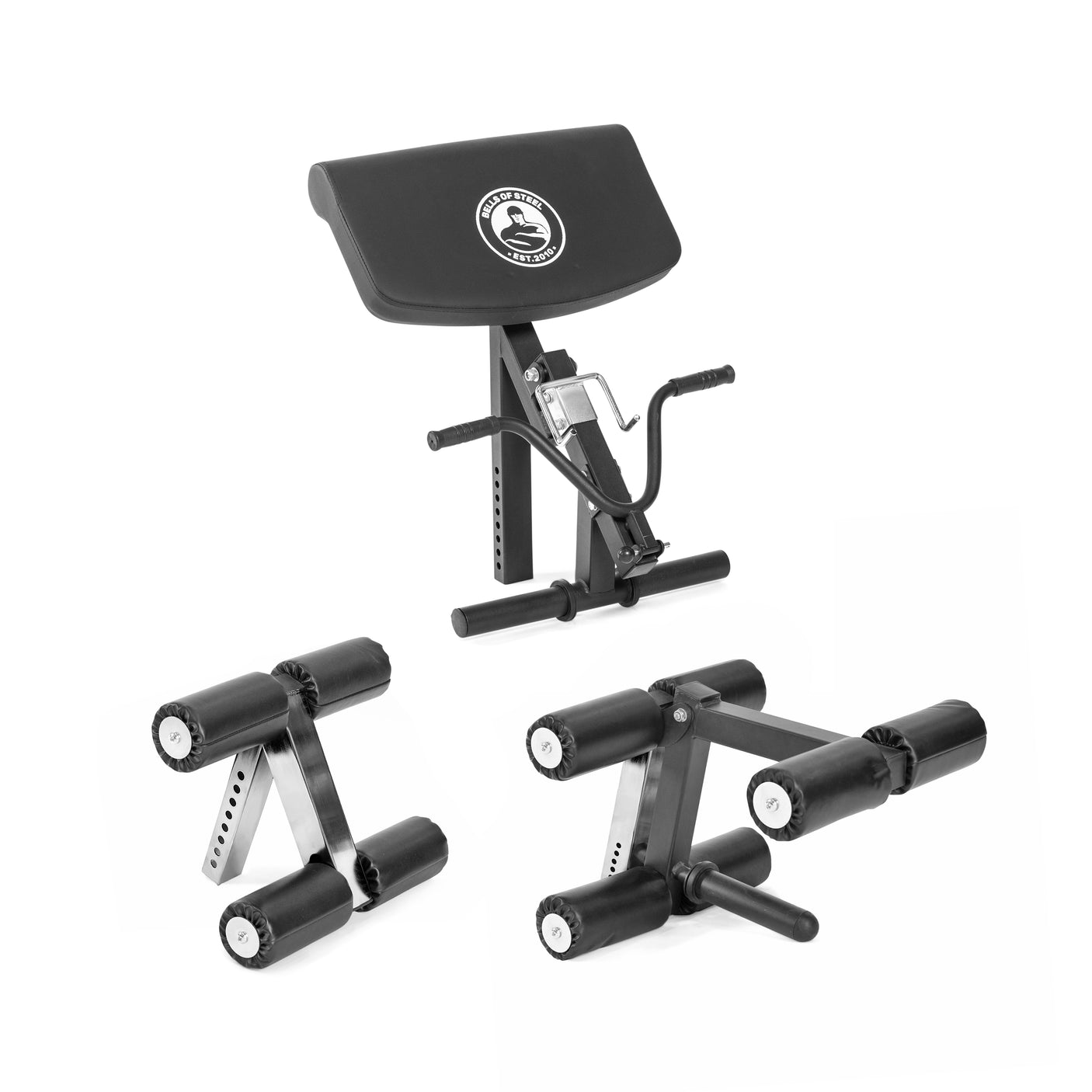 Three black and silver Bells of Steel Bench Attachments, with padded rollers and adjustment knobs for leg and arm exercises, including a leg extension curl attachment, are arranged on a white background.