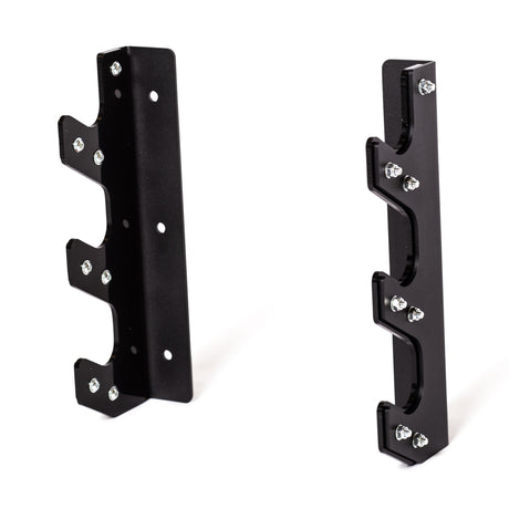 The Bells of Steel 3 Barbell Wall Rack includes two black metal brackets with multiple notched hooks and screws for secure, wall-mounted barbell storage, shown upright against a white background.