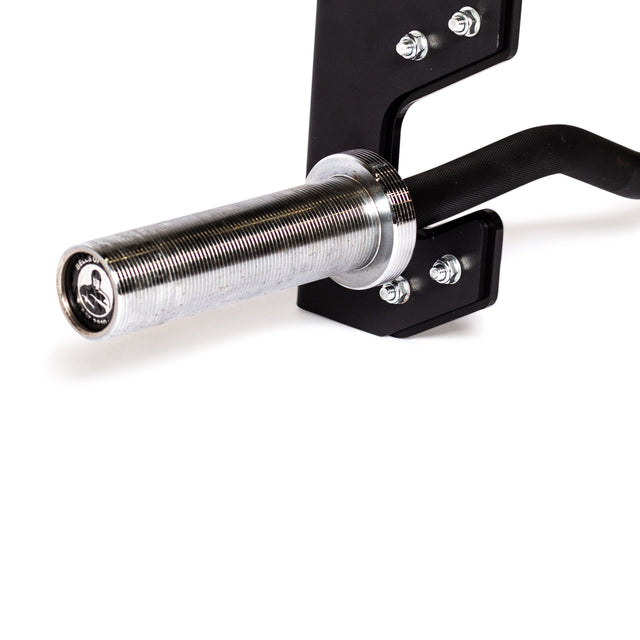 Close-up of the Bells of Steel 3 Barbell Wall Rack, featuring a metallic barbell on a black metal rack with HDPE plastic lining. The threaded end and securing bolts are visible against a white background, highlighting this storage solution.