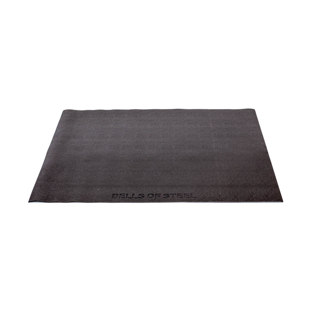 The Bells of Steel Cardio Machine Floor Mat is a large black rectangular rubber mat with the brand name embossed near one edge, perfect for protecting floors during workouts. Shown on a white background.