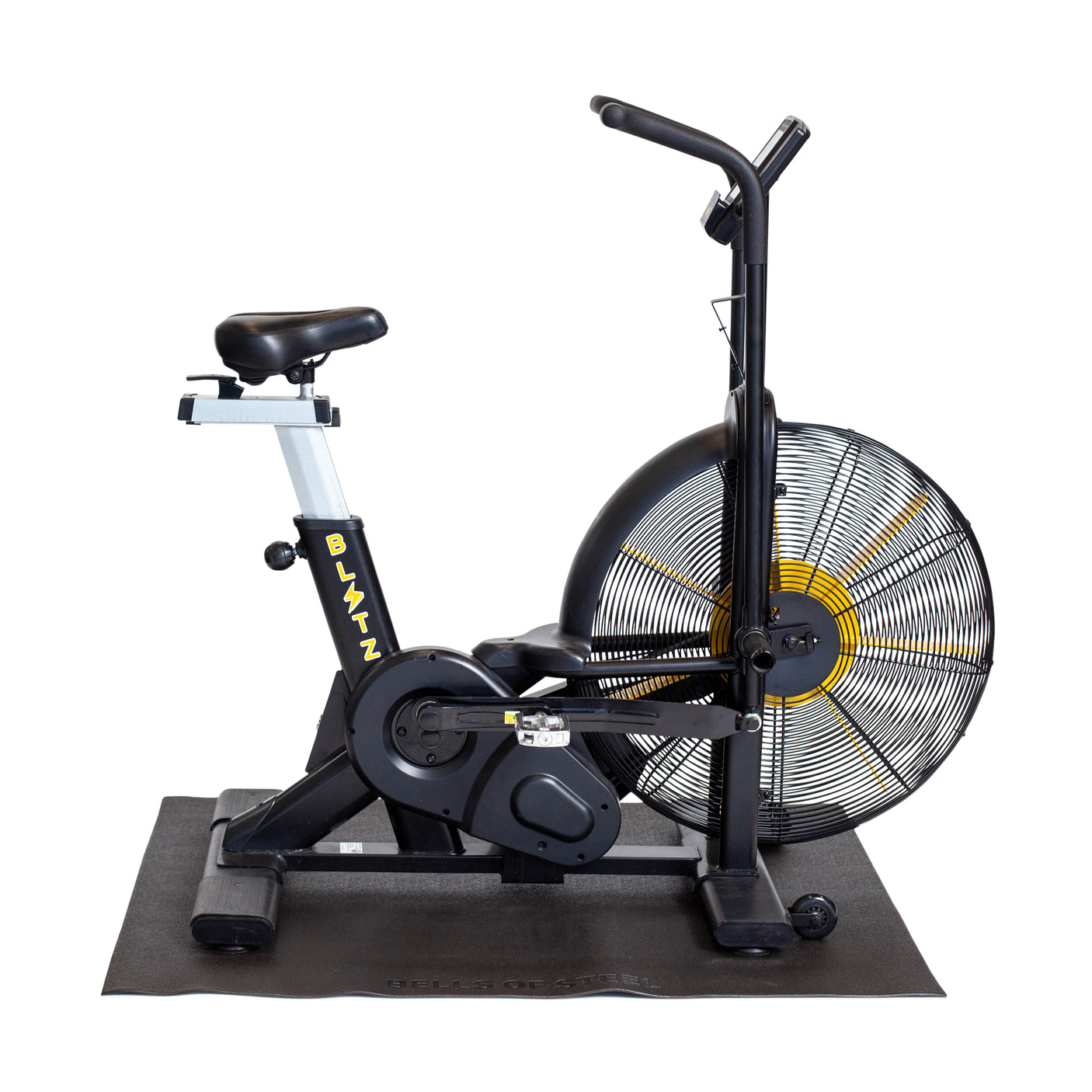 A black stationary air bike with moveable handlebars, a fan wheel, and padded seat sits on a Bells of Steel Cardio Machine Floor Mat against a white background.