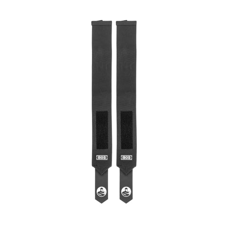 Two black Mighty Wrist Wraps by Bells of Steel, featuring rectangular Velcro patches, BOS branding near the bottom, and a white hand logo on each end—essential powerlifting support—are displayed side by side on a white background.