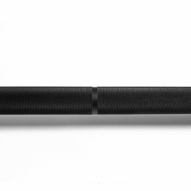 Close-up of the Bells of Steel Powerlifting Bar’s knurled grip, set against a plain white background—perfect for those seeking a budget-friendly and reliable powerlifting bar for serious training.