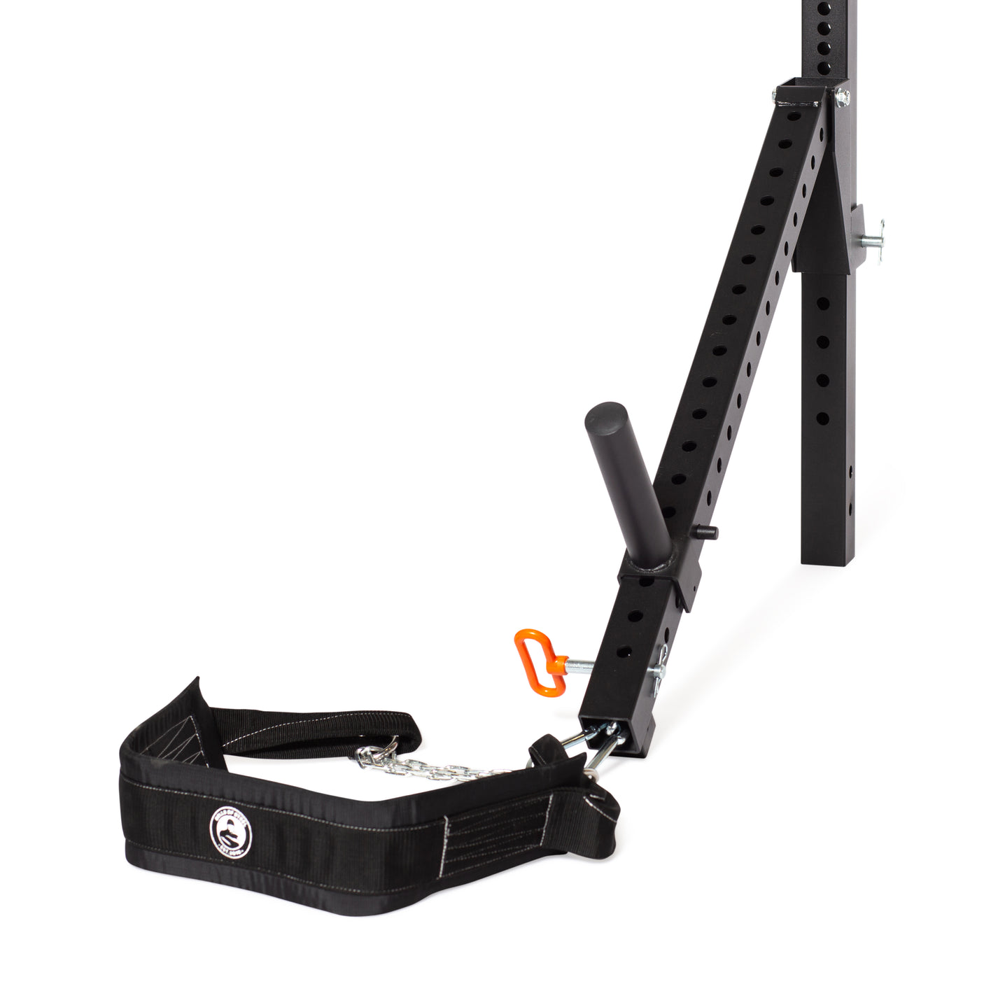 A black Bells of Steel harness with a logo connects to a rectangular perforated metal frame using an orange carabiner and chain, resembling home gym gear. Ideal as the versatile Belt Squat / Lever Arms Rack Attachment for strength exercises. The background is plain white.