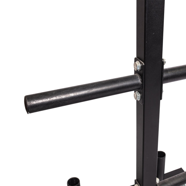 Close-up of the Bells of Steel Bumper Plate Weight Tree and Bar Holder, a black metal rack with a horizontal cylindrical bar bolted to a vertical frame, designed for organized weight plate storage. White background.