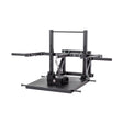 The Bells of Steel Belt Squat Machine is a black metal unit with a large platform, adjustable arms, and a chain with belt for lower body training at home. Shown against a white background.