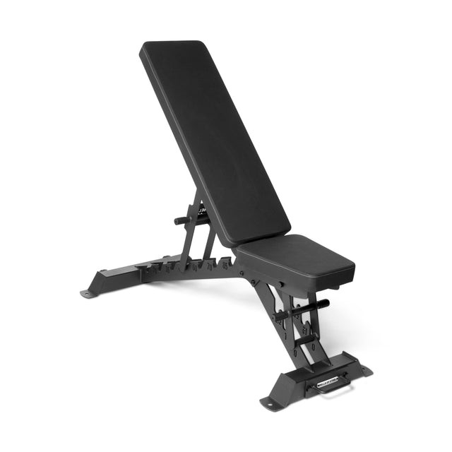 Discover the ultimate in exercise versatility with the Bells of Steel's Buzz-Saw Heavy-Duty Adjustable Bench. This black bench features a cushioned backrest and seat, sturdy metal frame, support bars, and footrests for various incline and flat positions in weight training exercises.