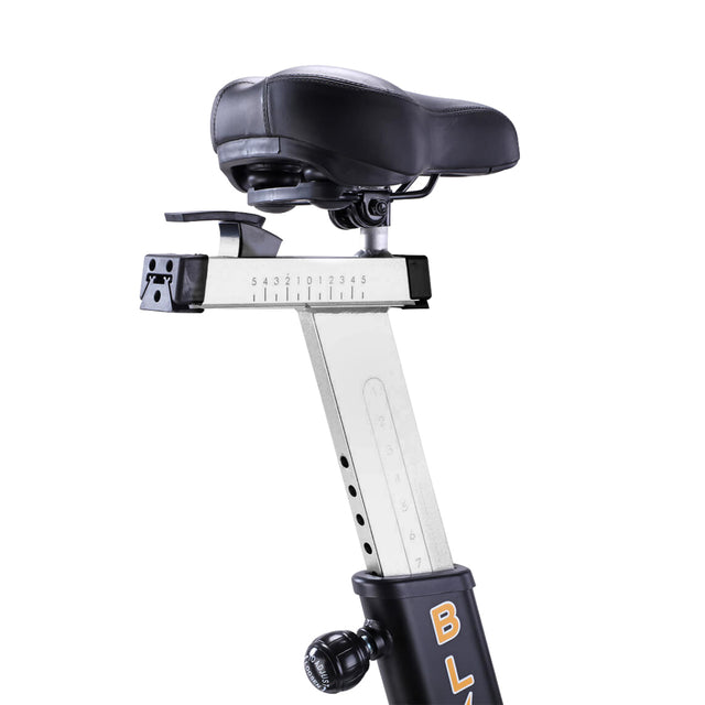 Close-up of the adjustable black seat on the Bells of Steel Blitz Air Bike, featuring a numbered metal rail, adjustment holes, and tightening knob—perfect for any home gym or full-body workout routine.