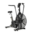 The Bells of Steel Blitz Air Bike is a black exercise machine with a large front fan, two vertical handlebars, cushioned seat, and pedals—perfect for full-body cardio workouts in your home gym.