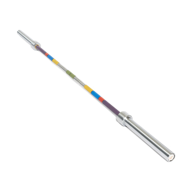 The Bells of Steel Hydra Seven Ring Bar is a silver powerlifting bar with a 2000lb capacity, featuring yellow, blue, green, and purple sections on the shaft in a repeating pattern. It is shown against a white background.
