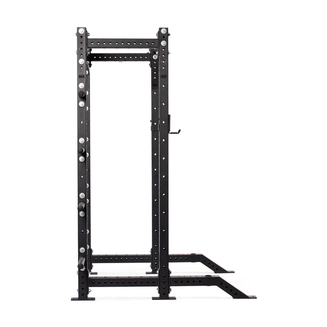 The Bells of Steel Hydra Collegiate Power Rack - Prebuilt (3" x 3", ⅝" holes) is a black metal, freestanding modular squat rack with multiple adjustment holes, supports, and a pull-up bar for home gym strength training. Shown on a plain white background.