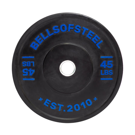 The black Dead Bounce Conflict Bumper Plate by Bells of Steel, labeled "45 LBS" and featuring "EST. 2010" in blue text, includes a stainless steel insert for durability, with mirrored weight markings for balanced workouts.