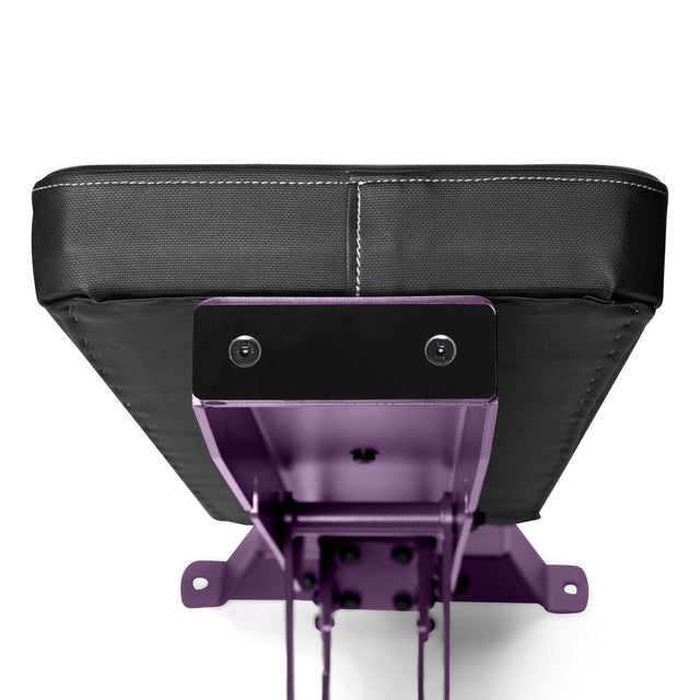 Close-up of a Buzz-Saw Heavy-Duty Adjustable Bench by Bells of Steel, showing its black cushioned underside with metal support and visible bolts for stability, set against a white background.