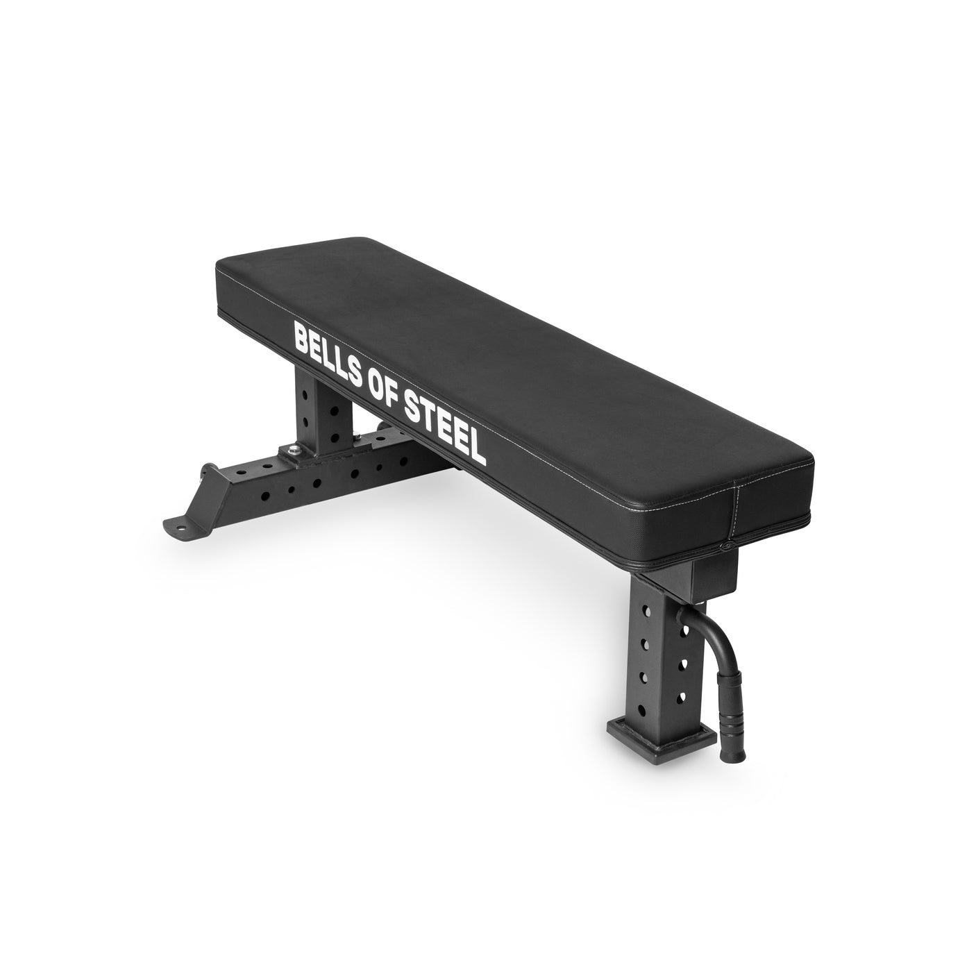 The Bells of Steel Powerlifting Flat Bench is a black commercial-grade bench with the brand name printed on the side, featuring a durable padded vinyl surface and sturdy metal legs with adjustable height holes.