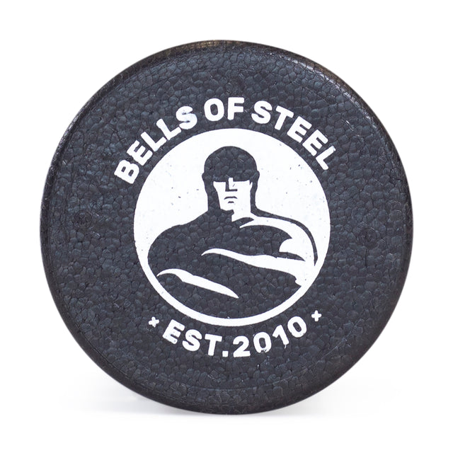 The Bells of Steel Foam Roller features a textured black surface with "BELLS OF STEEL EST. 2010" and a white graphic, making it perfect for mobility workouts and recovery.