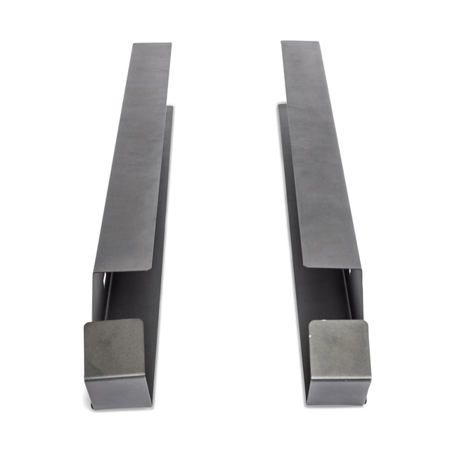 The Bells of Steel Foam Roller Storage features two parallel grey metal brackets with flat tops and square end caps, shown on a white background—perfect for organized wall-mounted foam roller storage.