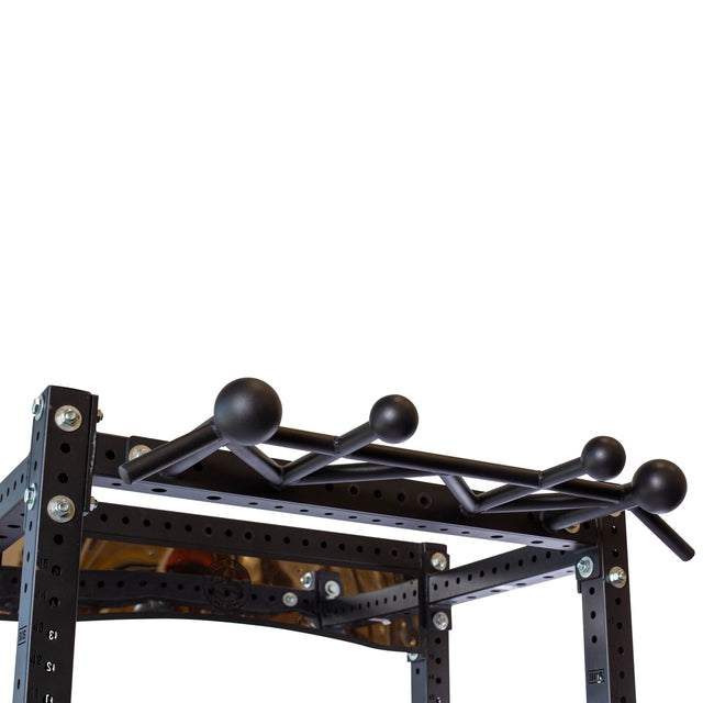 A close-up of the Bells of Steel Globe Pull Up Bar, featuring multiple grip positions and round grips, is mounted atop a modular power rack to enhance grip strength, set against a white background.