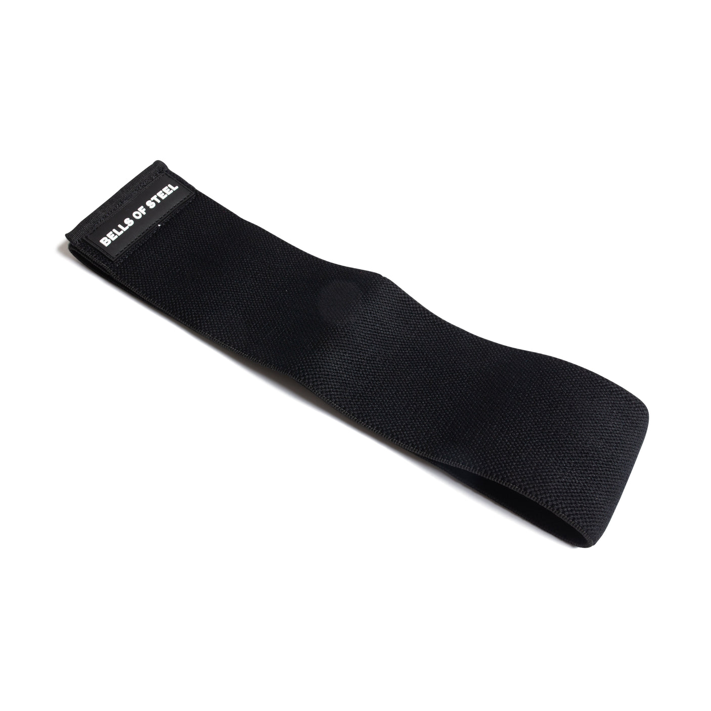 The Bells of Steel Glute Loop, a black resistance band with branded label, is ideal for boosting your glute workouts and is shown on a white background.