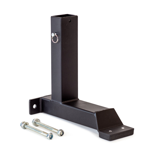 The Bells of Steel Bench Attachments include a black metal bracket with a vertical square tube, pin, and two silver bolts with nuts, designed for the Buzzsaw Bench. All items are displayed on a white background.