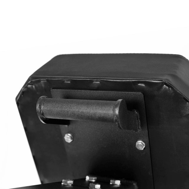 Close-up of the black padded handle with textured grip on the Bells of Steel Hero Heavy-Duty Weight Bench, mounted to its metal frame with visible bolts, shown against a white background.