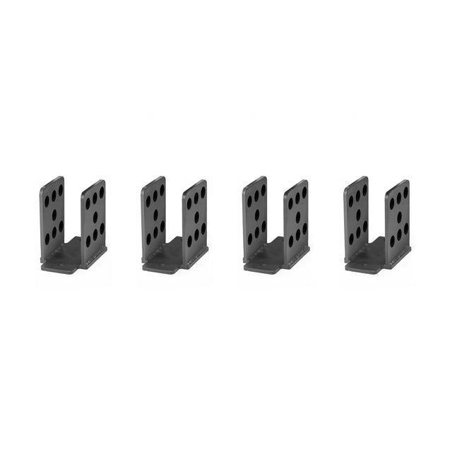 On a white background, four black metal L-shaped Folding Rack Wall Connectors & Hinges by Bells of Steel are perfectly aligned. These brackets have circular holes for mounting or structural support, ideal for use with Hydra & Manticore racks, ready to secure against wall studs.