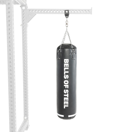 A black Heavy Bag Set from Bells of Steel USA hangs by chains from a metal frame against a white background, ideal for intense combat sports training.