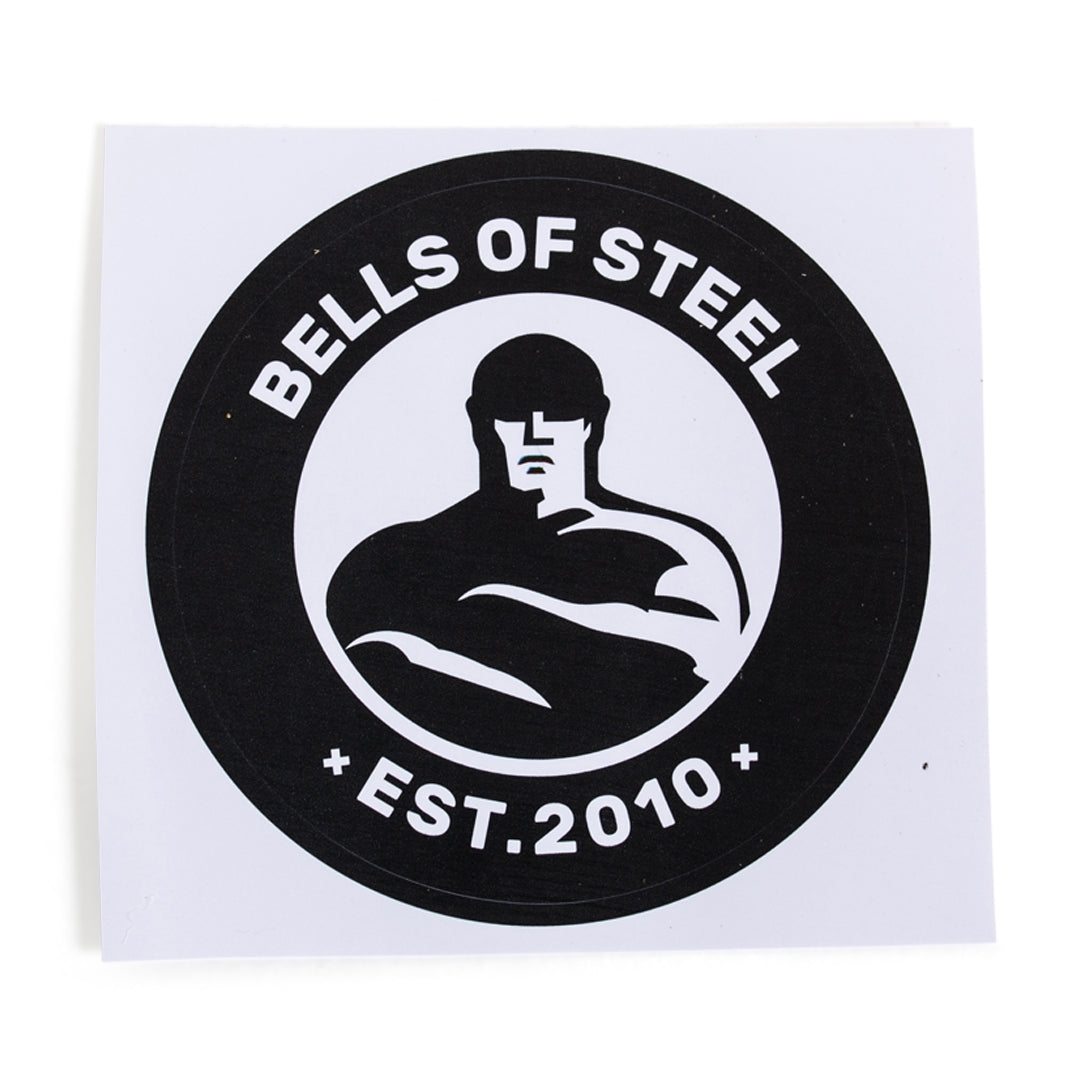 Bells of Steel Stickers: Durable black and white die-cut sticker with "BELLS OF STEEL" on top, "EST. 2010" below, and a muscular flexing figure in the center—bold style for fans of Bells of Steel.