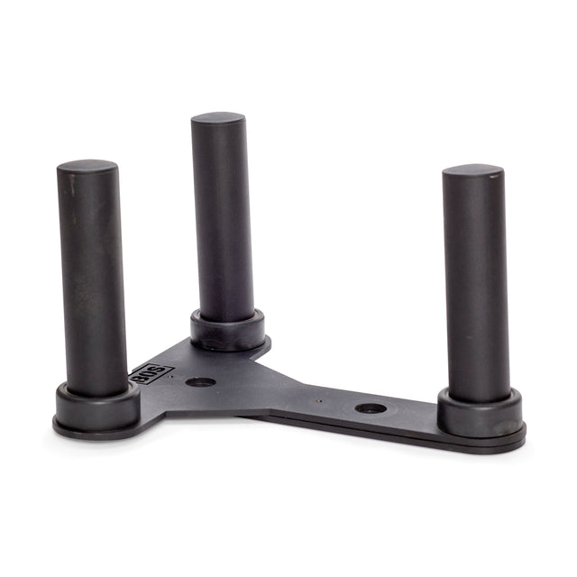 The Bells of Steel Change Plate Storage Pegs feature a black, triangular rack with three vertical posts designed for Olympic change plates. The base has three holes and rubber padding at the bottom of each post to improve stability.
