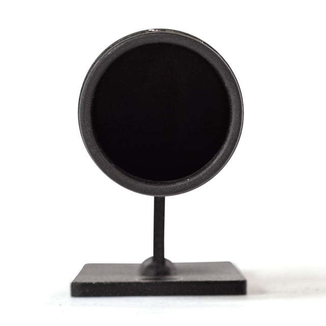 The Bells of Steel Vertical Mount Barbell Holder Rack Attachment is a black, circular holder on a small rectangular base, designed for efficient barbell storage. Shown from the front against a white background, it features a flat and minimalist look.