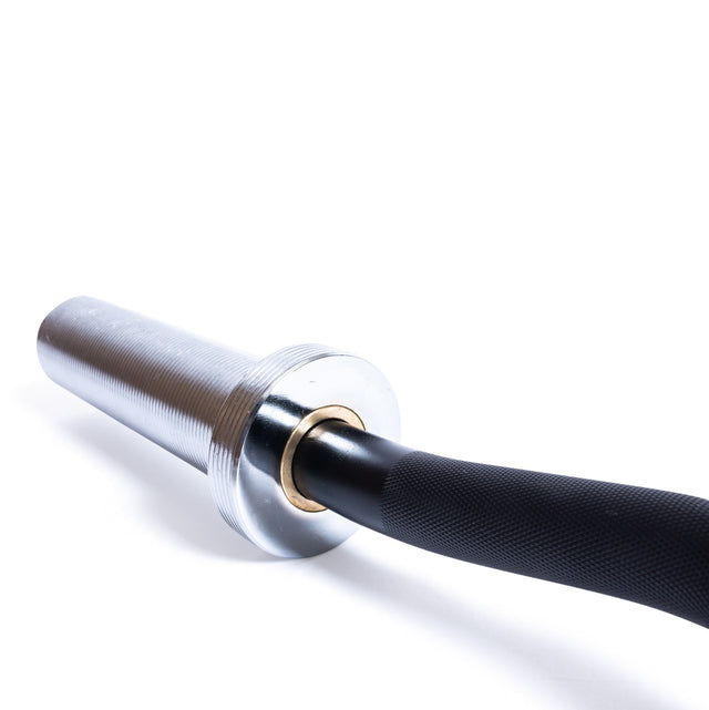 A close-up of the Bells of Steel EZ Curl Bar (45") shows its knurled black grip and textured metallic sleeve, emphasizing its design for effective biceps and triceps workouts against a white background.