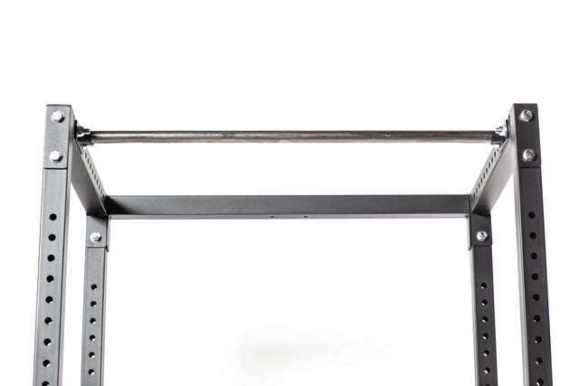 A close-up of the Bells of Steel Residential Power Rack (2.3" x 2.3", ⅝" holes) in black metal, featuring a pull-up bar, j-cups, and multiple adjustment points—perfect for any home gym setup against a white background.