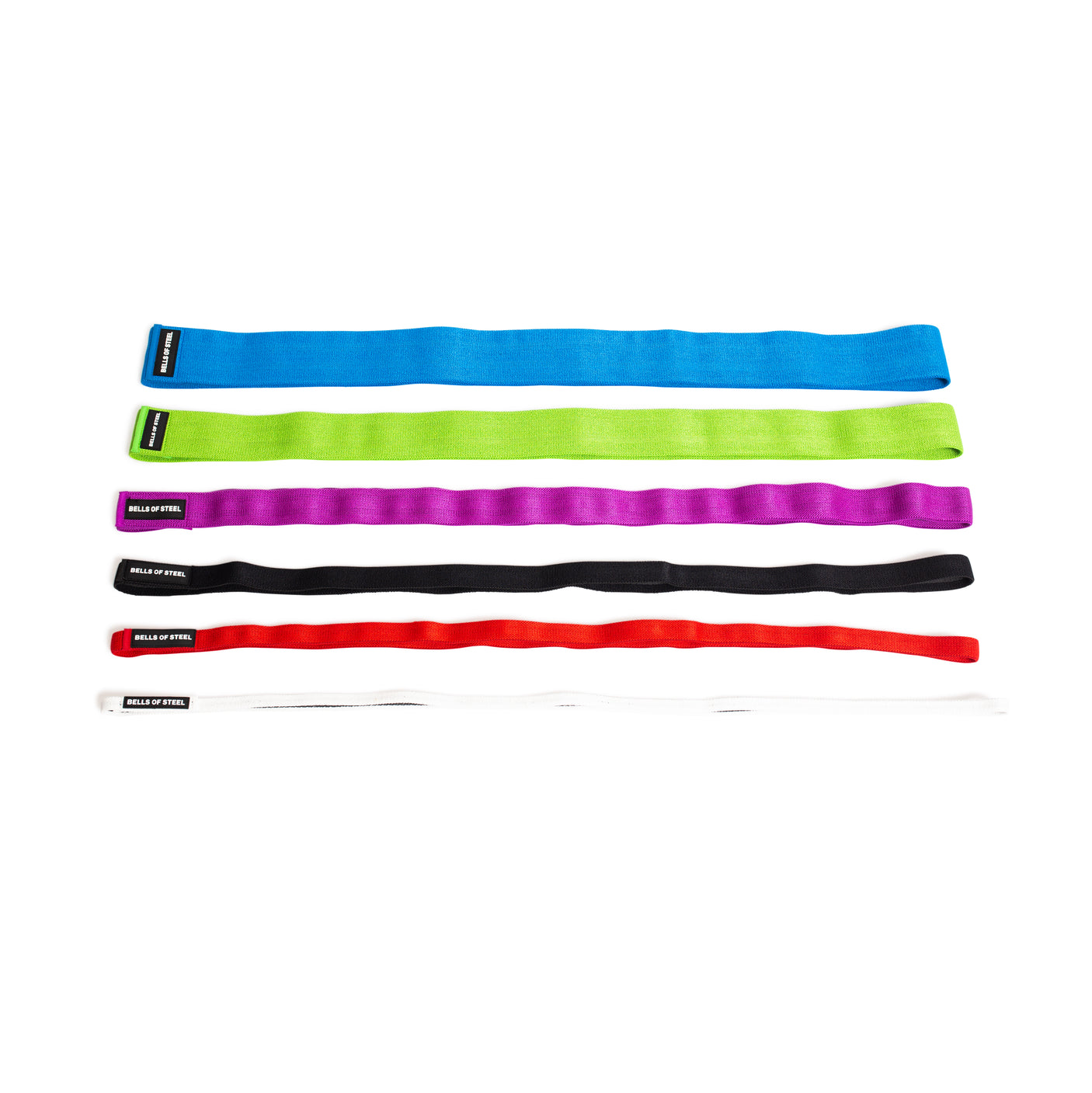 Five flat, 41" Fabric Non-Slip Resistance Bands by Bells of Steel—blue, green, purple, black, red, and white—are laid out horizontally on a white background. Each band is labeled for easy selection for powerlifting or mobility routines.