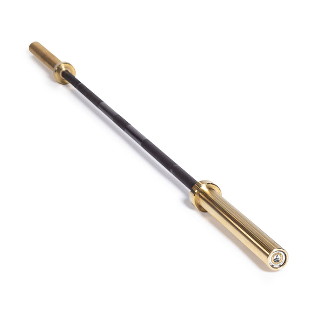 The Bells of Steel Olympic Weightlifting Barbell, featuring black and gold finishes with prominent gold sleeves on each end, is shown at an angle against a white background.