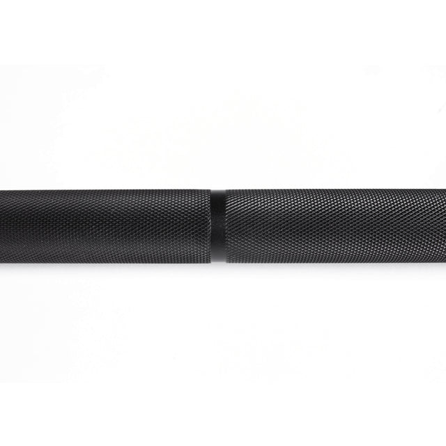 Close-up of the Bells of Steel Olympic Weightlifting Barbell, featuring a black knurled grip and highlighting the join between two sections, set against a plain white background.